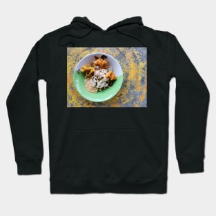 Thai street food. Asian yellow egg noodle with chicken and shrimp on cement background. Hoodie